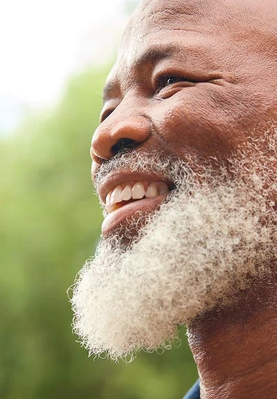 man loving his dentures from Avenue Dental Care